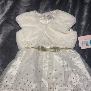 Jona Michelle, Elegant Ivory dress with Gold Bow.